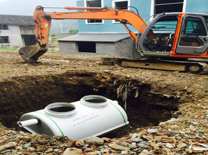 fiberglass septic tank being installed